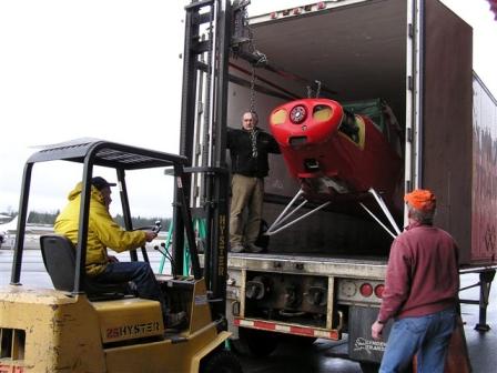 Bishop Plane being unloaded