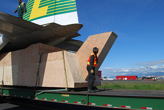 Ike with crated airplane