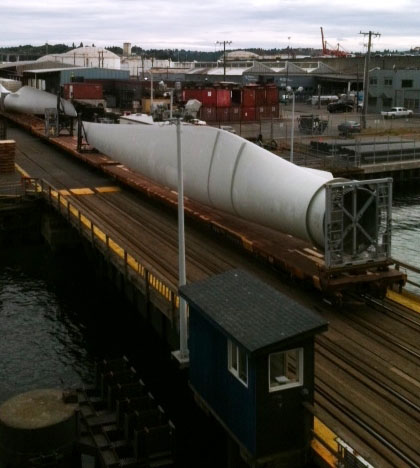 Giant windmill blades ride Alaska Marine Lines barge