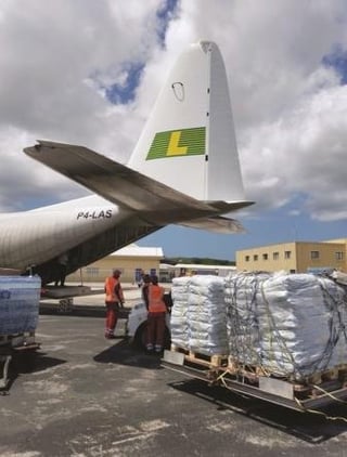 Hurricane response - LAC with sandbags on tarmac.jpg