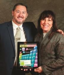 Top 49 luncheon - Jeanine St. John and Charles Bell of Alaska Business Monthly.jpg